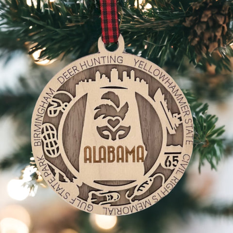 An intricately crafted Alabama State Highlights Ornament featuring iconic landmarks and symbols, showcasing the rich heritage and vibrant culture of the Heart of Dixie.
