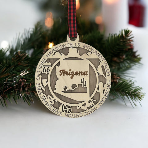 Arizona State Highlights Ornament: A festive decoration featuring iconic symbols and landmarks of Arizona, capturing the essence of the Grand Canyon State in a delightful holiday keepsake.