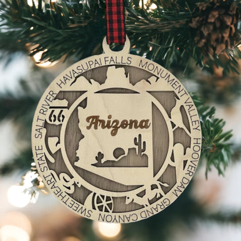 Arizona State Highlights Ornament: A festive decoration featuring iconic symbols and landmarks of Arizona, capturing the essence of the Grand Canyon State in a delightful holiday keepsake.