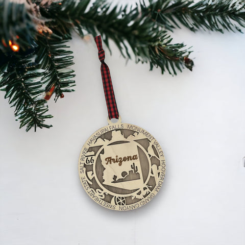 Arizona State Highlights Ornament: A festive decoration featuring iconic symbols and landmarks of Arizona, capturing the essence of the Grand Canyon State in a delightful holiday keepsake.