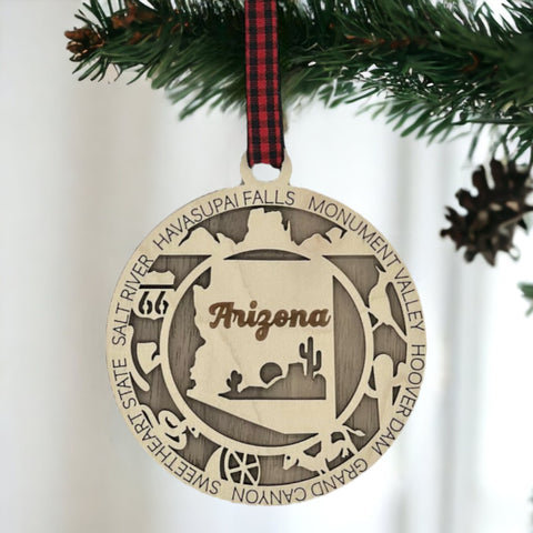 Arizona State Highlights Ornament: A festive decoration featuring iconic symbols and landmarks of Arizona, capturing the essence of the Grand Canyon State in a delightful holiday keepsake.