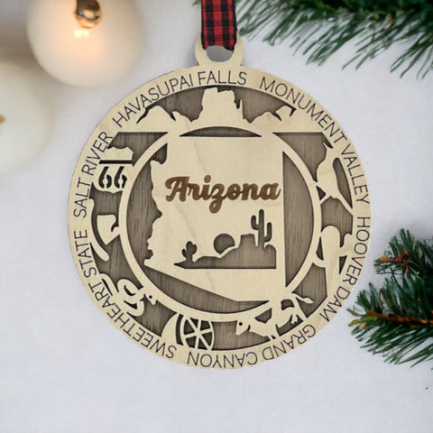 Arizona State Highlights Ornament: A festive decoration featuring iconic symbols and landmarks of Arizona, capturing the essence of the Grand Canyon State in a delightful holiday keepsake.