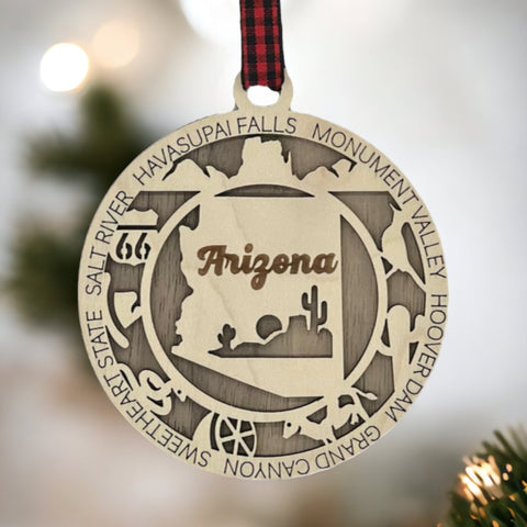 Arizona State Highlights Ornament: A festive decoration featuring iconic symbols and landmarks of Arizona, capturing the essence of the Grand Canyon State in a delightful holiday keepsake.