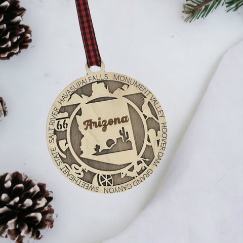 Arizona State Highlights Ornament: A festive decoration featuring iconic symbols and landmarks of Arizona, capturing the essence of the Grand Canyon State in a delightful holiday keepsake.