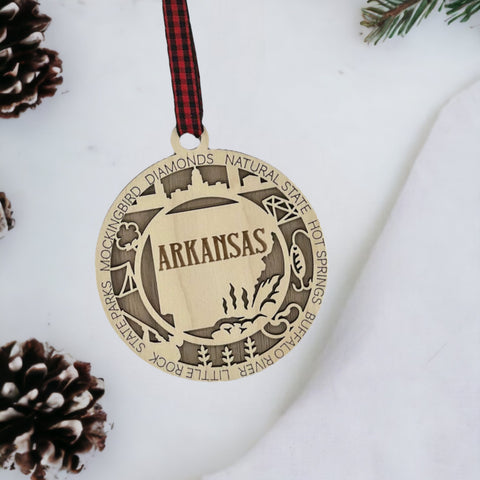 Arkansas State Highlights Ornament: A festive holiday decoration showcasing the natural beauty and cultural heritage of Arkansas, featuring iconic landmarks and symbols that celebrate the charm of the Natural State.