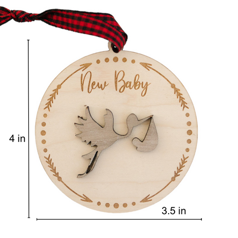 Embrace the joy of Baby's First Christmas with our delightful Stork Ornament. This charming keepsake, intricately designed, is the perfect addition to commemorate this special milestone.