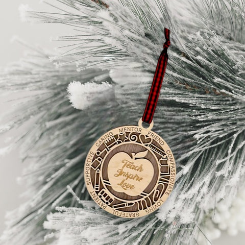 Cherish the season with our Teacher Appreciation Christmas Ornament, a symbol of gratitude for those who shape minds. Featuring a delicate apple design, it's the perfect gift for educators who inspire. Crafted with care, this timeless ornament adds warmth to your holiday decor, embodying the spirit of appreciation.