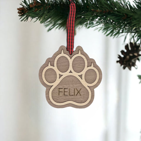 Sweet and Personalized Cat Paw Ornament - Adorn your tree with this delightful ornament featuring a cute cat paw print. Customize it with your cat's name for a unique touch, celebrating the feline charm that brightens your holiday season