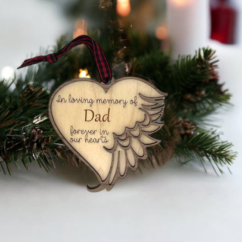 Customized memorial ornament, a touching tribute to Dad. Crafted with care, this personalized keepsake captures the essence of his love and enduring presence, offering a meaningful remembrance during the holiday season.