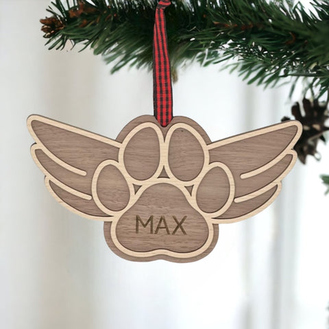 Gentle tribute with the Dog Paw Personalized Memorial Ornament - A loving remembrance for your cherished canine friend. Personalize with your dog's name, creating a special ornament to honor their memory during the holiday season.
