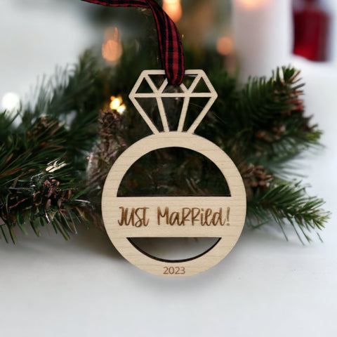 Just Married Ornament - Celebrate the newlywed bliss with this charming decoration, featuring a whimsical design. A perfect addition to your holiday decor, capturing the joy and love of the recent union.