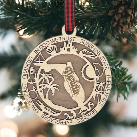 Capture the Sunshine State's magic with our Florida State Highlights Ornament – a shimmering keepsake adorned with iconic symbols. From pristine beaches to vibrant cities, this ornament beautifully encapsulates the essence of Florida. Bring home a touch of sunshine and memories with this exquisite piece for your holiday decor.