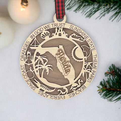 Capture the Sunshine State's magic with our Florida State Highlights Ornament – a shimmering keepsake adorned with iconic symbols. From pristine beaches to vibrant cities, this ornament beautifully encapsulates the essence of Florida. Bring home a touch of sunshine and memories with this exquisite piece for your holiday decor.