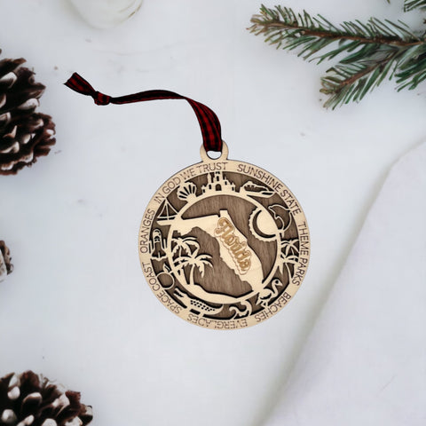 Capture the Sunshine State's magic with our Florida State Highlights Ornament – a shimmering keepsake adorned with iconic symbols. From pristine beaches to vibrant cities, this ornament beautifully encapsulates the essence of Florida. Bring home a touch of sunshine and memories with this exquisite piece for your holiday decor.