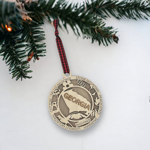 Radiate Southern charm with our Georgia State Highlights Ornament – a delightful keepsake adorned with iconic landmarks and symbols. From historic sites to lush landscapes, this ornament captures the heart and soul of Georgia. Add a touch of southern elegance to your holiday decor with this beautiful piece, celebrating the Peach State in all its glory.