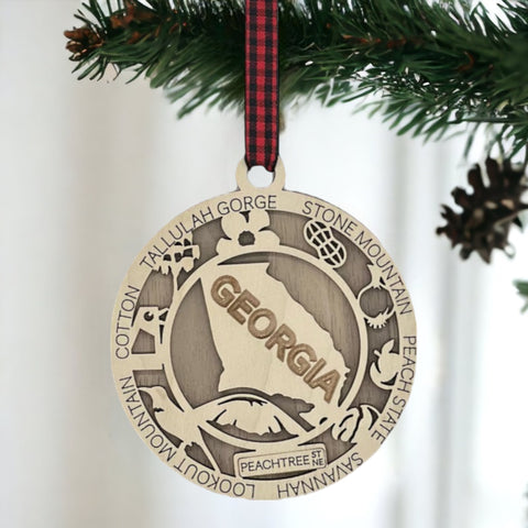 Radiate Southern charm with our Georgia State Highlights Ornament – a delightful keepsake adorned with iconic landmarks and symbols. From historic sites to lush landscapes, this ornament captures the heart and soul of Georgia. Add a touch of southern elegance to your holiday decor with this beautiful piece, celebrating the Peach State in all its glory.