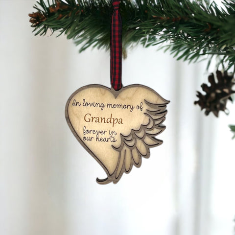 Thoughtfully crafted personalized memorial ornament in remembrance of Grandpa. A special tribute capturing his enduring spirit and love, creating a cherished keepsake to honor his memory during the holiday season.