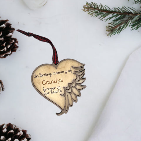 Thoughtfully crafted personalized memorial ornament in remembrance of Grandpa. A special tribute capturing his enduring spirit and love, creating a cherished keepsake to honor his memory during the holiday season.