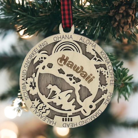 Capture the Spirit of Aloha! Elevate your holiday decor with our Hawaii State Highlights Ornament. From stunning beaches to majestic volcanoes, bring the essence of paradise to your tree!