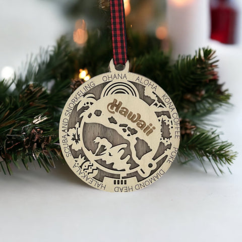 Capture the Spirit of Aloha! Elevate your holiday decor with our Hawaii State Highlights Ornament. From stunning beaches to majestic volcanoes, bring the essence of paradise to your tree!