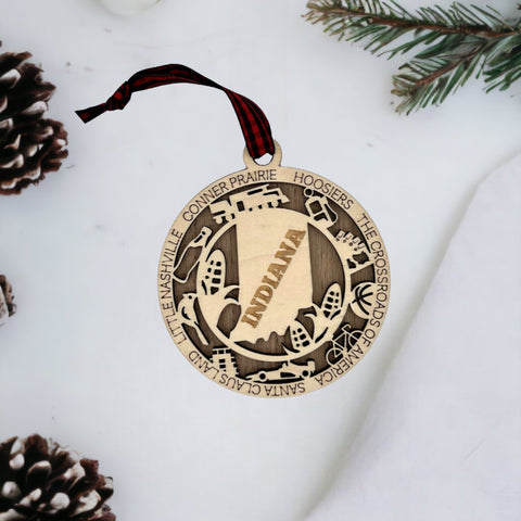 Deck the halls with Hoosier pride! Introducing our Indiana State Highlights Ornament, a perfect blend of charm and tradition. Celebrate the beauty of the Crossroads of America in every detail.