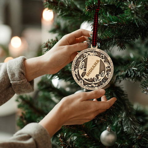 Deck the halls with Hoosier pride! Introducing our Indiana State Highlights Ornament, a perfect blend of charm and tradition. Celebrate the beauty of the Crossroads of America in every detail.