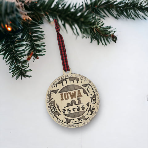 Sprinkle some Hawkeye magic on your tree! Our Iowa State Highlights Ornament is a festive nod to the heartland's beauty. From rolling cornfields to iconic landmarks, celebrate the charm of the Hawkeye State this holiday season.