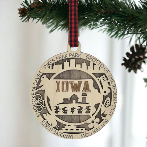 Sprinkle some Hawkeye magic on your tree! Our Iowa State Highlights Ornament is a festive nod to the heartland's beauty. From rolling cornfields to iconic landmarks, celebrate the charm of the Hawkeye State this holiday season.