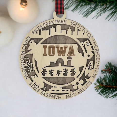 Sprinkle some Hawkeye magic on your tree! Our Iowa State Highlights Ornament is a festive nod to the heartland's beauty. From rolling cornfields to iconic landmarks, celebrate the charm of the Hawkeye State this holiday season.
