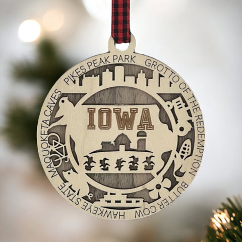 Sprinkle some Hawkeye magic on your tree! Our Iowa State Highlights Ornament is a festive nod to the heartland's beauty. From rolling cornfields to iconic landmarks, celebrate the charm of the Hawkeye State this holiday season.