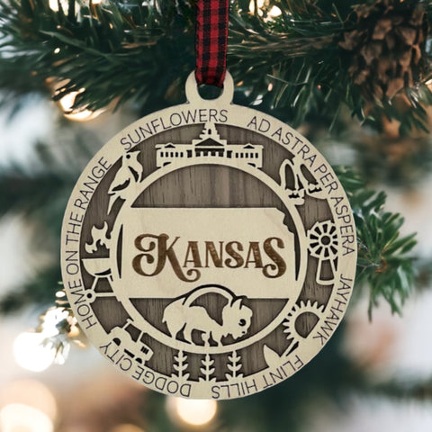 Bring the beauty of the Sunflower State to your holiday tree! Our Kansas State Highlights Ornament captures the essence of the heartland. Elevate your festive decor with the charm of wheat fields and iconic landmarks.