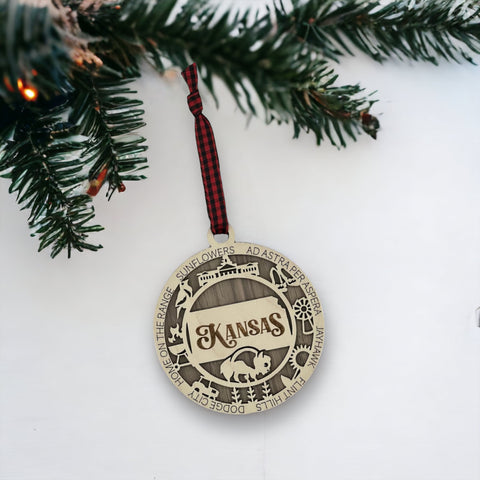 Bring the beauty of the Sunflower State to your holiday tree! Our Kansas State Highlights Ornament captures the essence of the heartland. Elevate your festive decor with the charm of wheat fields and iconic landmarks.