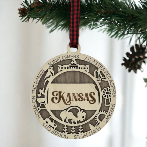 Bring the beauty of the Sunflower State to your holiday tree! Our Kansas State Highlights Ornament captures the essence of the heartland. Elevate your festive decor with the charm of wheat fields and iconic landmarks.