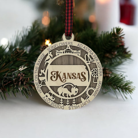 Bring the beauty of the Sunflower State to your holiday tree! Our Kansas State Highlights Ornament captures the essence of the heartland. Elevate your festive decor with the charm of wheat fields and iconic landmarks.