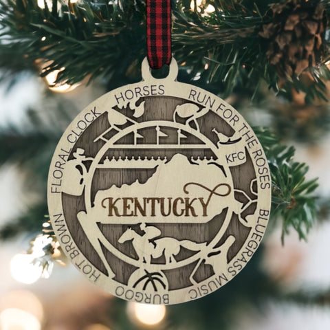 Deck the halls with Bluegrass brilliance! Introducing our Kentucky State Highlights Ornament, a festive tribute to the beauty of the Bluegrass State. From rolling hills to iconic landmarks, add a touch of Kentucky charm to your holiday decor!
