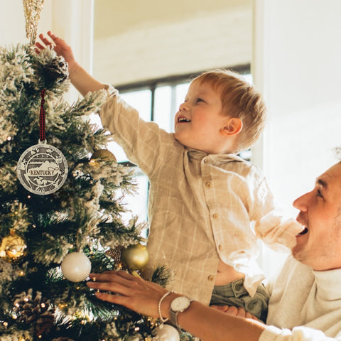 Deck the halls with Bluegrass brilliance! Introducing our Kentucky State Highlights Ornament, a festive tribute to the beauty of the Bluegrass State. From rolling hills to iconic landmarks, add a touch of Kentucky charm to your holiday decor!