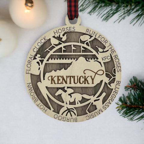 Deck the halls with Bluegrass brilliance! Introducing our Kentucky State Highlights Ornament, a festive tribute to the beauty of the Bluegrass State. From rolling hills to iconic landmarks, add a touch of Kentucky charm to your holiday decor!