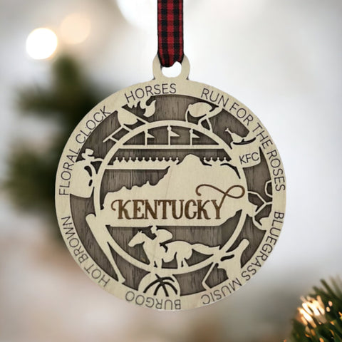 Deck the halls with Bluegrass brilliance!  Introducing our Kentucky State Highlights Ornament, a festive tribute to the beauty of the Bluegrass State. From rolling hills to iconic landmarks, add a touch of Kentucky charm to your holiday decor! 