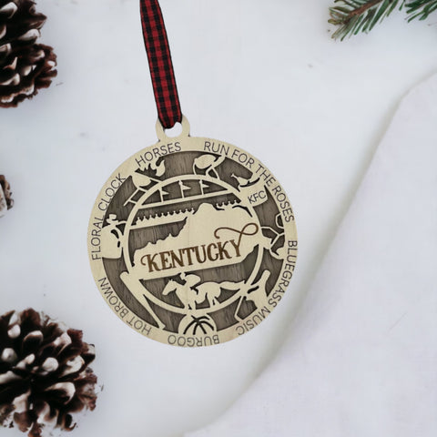 Deck the halls with Bluegrass brilliance! Introducing our Kentucky State Highlights Ornament, a festive tribute to the beauty of the Bluegrass State. From rolling hills to iconic landmarks, add a touch of Kentucky charm to your holiday decor!