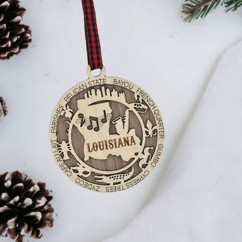 Infuse your festivities with Louisiana flair! Our Louisiana State Highlights Ornament captures the vibrant spirit of the Bayou State. From jazz-filled streets to iconic landmarks, let the Pelican State charm your holiday decor.