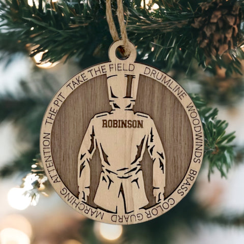 Strike up the holiday cheer with our Personalized Male Marching Band Ornament! Tailored for music enthusiasts, this custom keepsake adds a personal touch to your tree. Celebrate the musician in your life with this spirited ornament. Customize now for a harmonious note in holiday decor – order your Personalized Male Marching Band Ornament today!