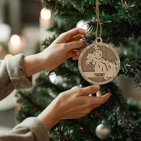 Saddle up for holiday spirit with our Personalized Male Rodeo Ornament! Crafted for rodeo enthusiasts, this custom keepsake adds a personal touch to your tree. Celebrate the cowboy in your life with this spirited ornament. Customize now for a rodeo-ready touch in holiday decor – order your Personalized Male Rodeo Ornament today!