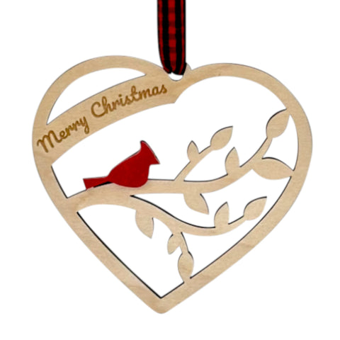 A wooden heart-shaped ornament adorned with intricate carvings. The words 'Merry Christmas' are elegantly engraved across the top of the heart. This memorial ornament captures the spirit of Christmas with its heartfelt design.