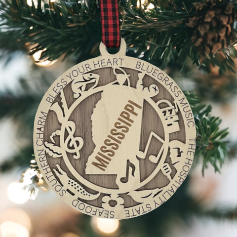 Dazzle your tree with Mississippi magic! Our Highlights Ornament captures the soul of the Magnolia State in every detail. Elevate your holiday with Southern charm and iconic moments.
