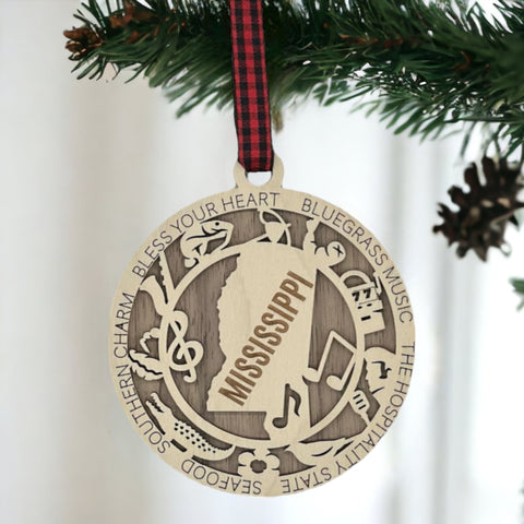 Dazzle your tree with Mississippi magic! Our Highlights Ornament captures the soul of the Magnolia State in every detail. Elevate your holiday with Southern charm and iconic moments.