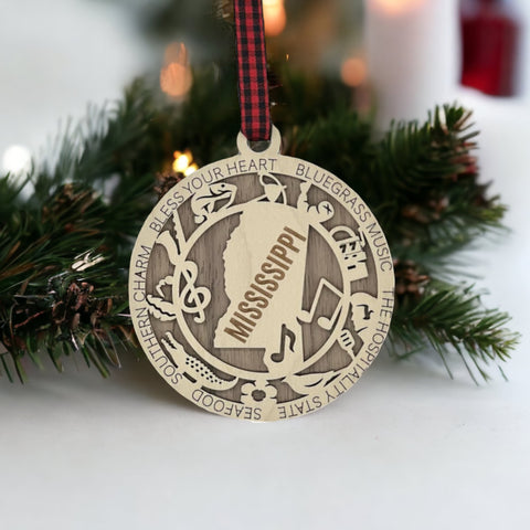 Dazzle your tree with Mississippi magic! Our Highlights Ornament captures the soul of the Magnolia State in every detail. Elevate your holiday with Southern charm and iconic moments.