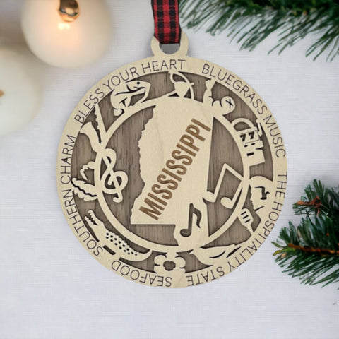 Dazzle your tree with Mississippi magic! Our Highlights Ornament captures the soul of the Magnolia State in every detail. Elevate your holiday with Southern charm and iconic moments.