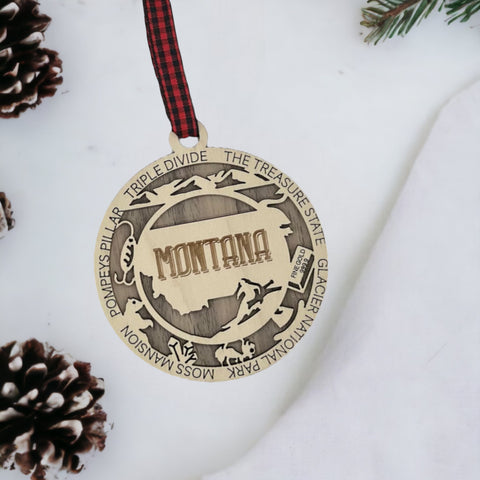 Elevate your tree with a touch of Big Sky State beauty! Our Montana Highlights Ornament captures the essence of the wilderness and iconic moments.