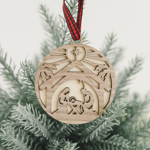 Handcrafted wooden nativity scene ornament depicting the holy family in a serene manger setting, capturing the timeless beauty of the Christmas story.