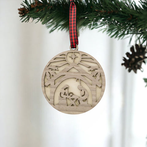 Handcrafted wooden nativity scene ornament depicting the holy family in a serene manger setting, capturing the timeless beauty of the Christmas story.